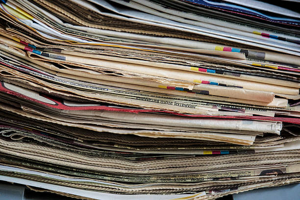 istock stack of old newspapers and magazines, paper texture 600404470