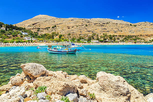 istock Fishing boat in Lindos Bay, Rhodes 600404500