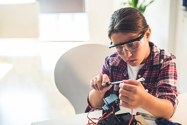 istock Repairing the robot 600405866
