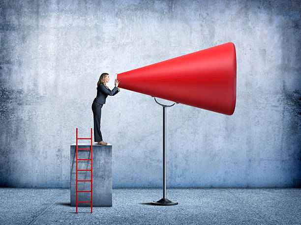 istock Businesswoman Having Her Voice Amplified 600407264