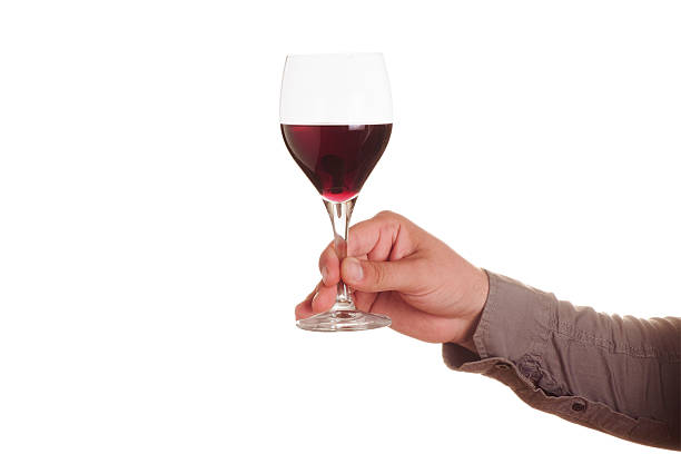 male hand with red wine glass - toast glass cut out human hand imagens e fotografias de stock