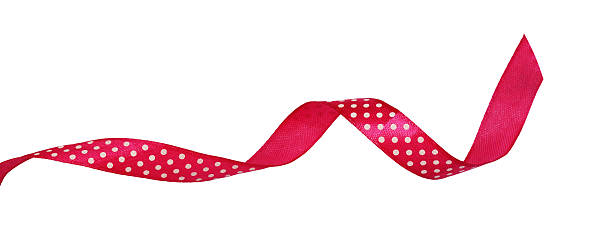 istock Pink silk polka dot ribbon 600407902
