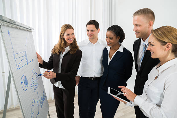istock Manager Explaining Business Strategy To The Staffs 600409726