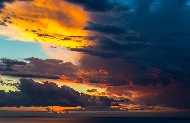 istock Abstract background of beautiful sunrise and dramatic clouds 600412022