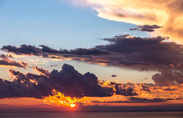 istock Abstract background of beautiful sunrise and dramatic clouds 600412092