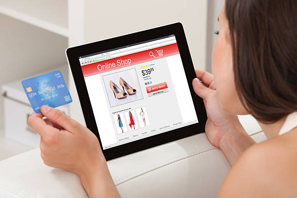 istock Woman Shopping Online On Digital Tablet 600412186