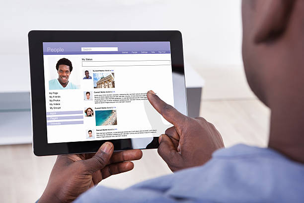 istock Close-up Of A Person Using Digital Tablet 600412452