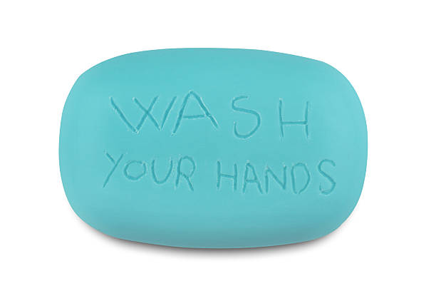 istock Blue soap bar with wash your hands written 600412524