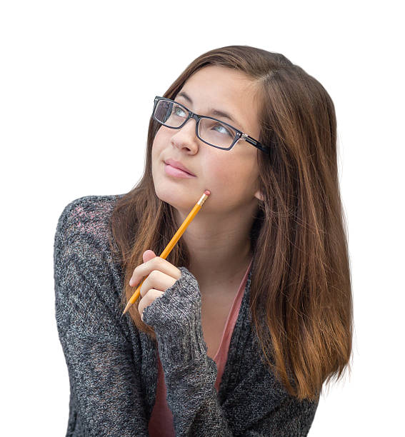 istock Pretty Mixed Race Girl Thinking with Pencil 600413432