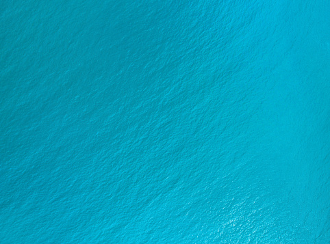 the surface of the water, turquoise in color with bird's eye