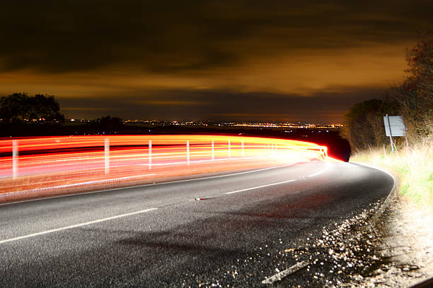 istock Light Trails and City Skyline 600415842