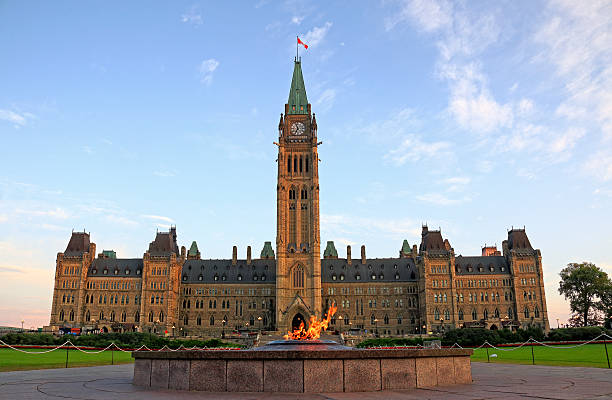 Ottawa Parliament Building and Cennential Flame stock photo