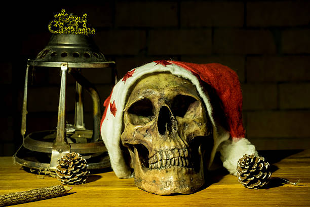istock Still life with skull in christmas day, dark concept 600417552
