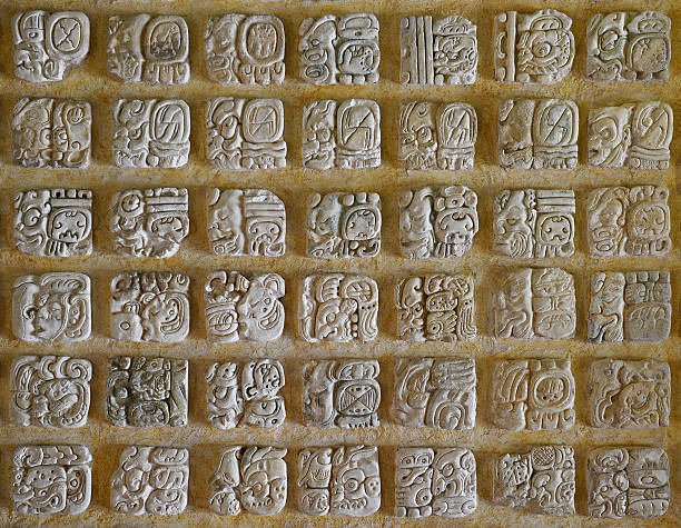 alfabeto maya - carved letters foto e immagini stock