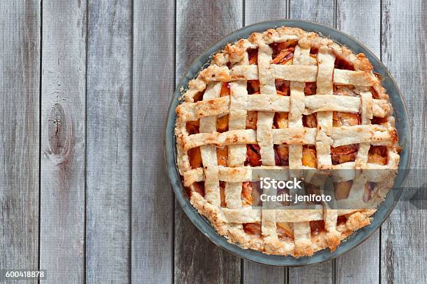 Rustic Homemade Peach Pie Above View On Wood Stock Photo - Download Image Now - Sweet Pie, Directly Above, Table