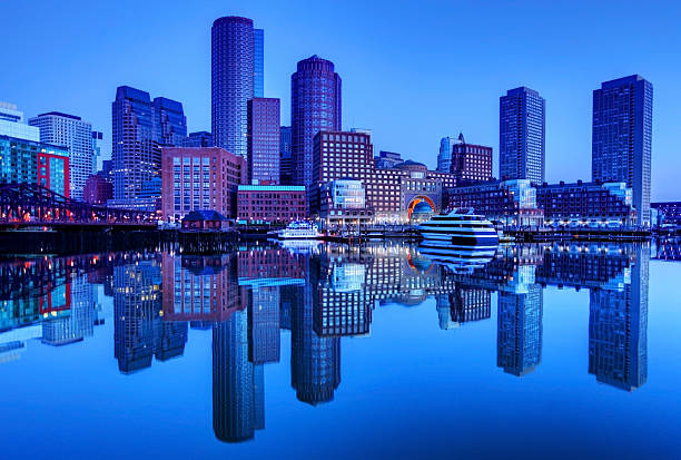 istock Boston downtown skyline refection on the harbor waterfront 600670668