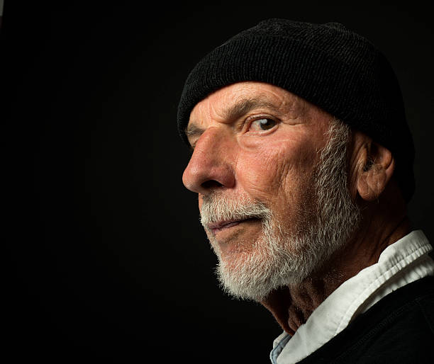 istock Serious Old Guy, Low-Key Grunge Lighting, Senior Man, Gothic Style 600671278