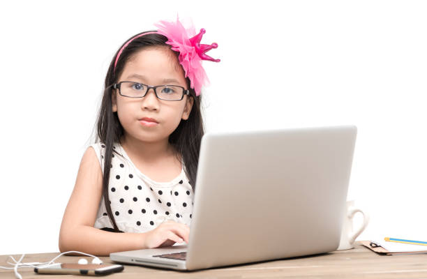 istock cute student girl with laptop computer on the table isolated 600671642