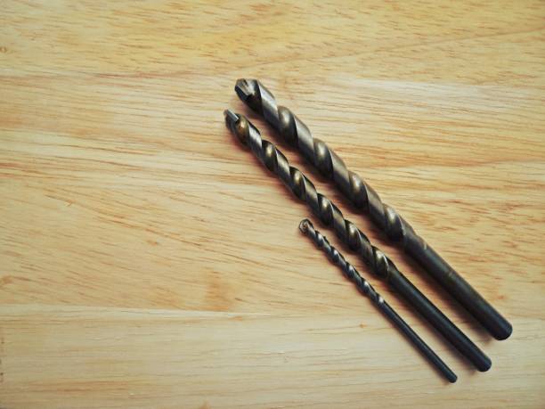 istock Set of drill bits on wooden background 600674292
