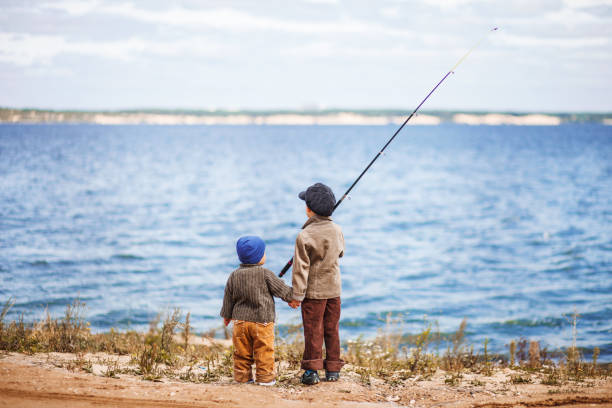 istock The Children fishing. 600679888