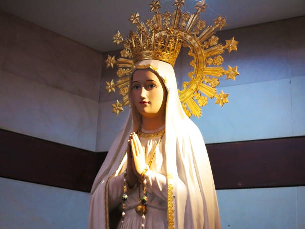 istock Virgin Mary with Golden Crown 600682488