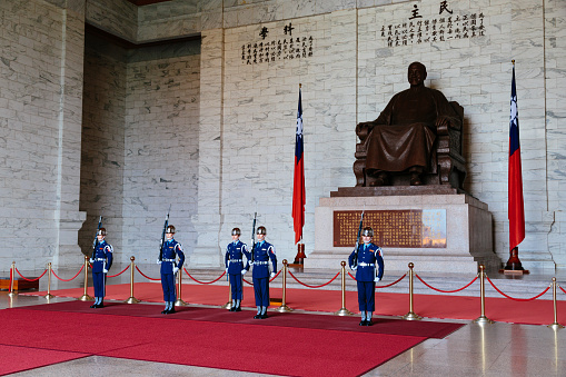 Taipei, Taiwan - July 13, 2016: Honor Guard marching at the Chiang Kai-Shek Memorial Hall in Taipei. Chiang Kai-shek Memorial Hall is a popular travel destination among tourists visiting Taiwan. Chiang Kai-shek, former President of Taiwan. 