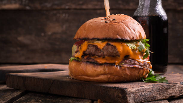 istock fast food with burger or cheeseburger, and soft drink 600684932