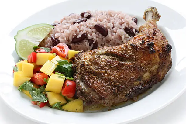 Photo of jerk chicken plate, jamaican food