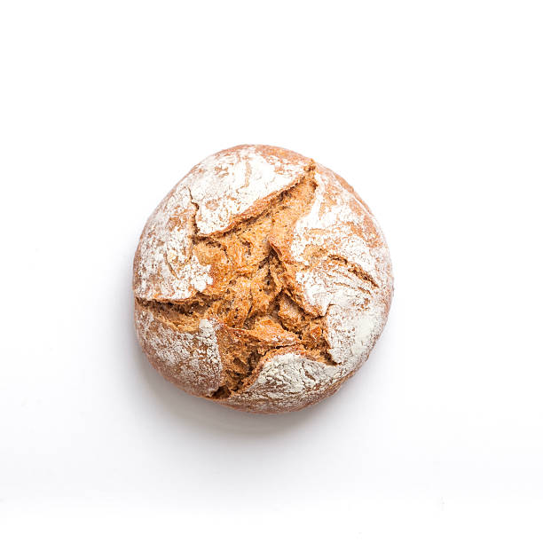 nahaufnahme von brot vor weißem hintergrund - bread stock-fotos und bilder