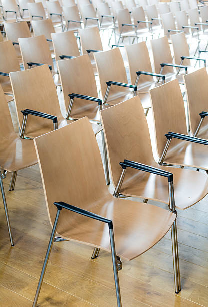 istock Wooden Chairs in a row 600689570