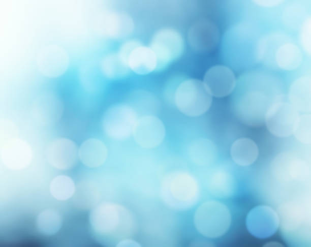 istock Blue defocused blur lights snowy winter background. 600690690