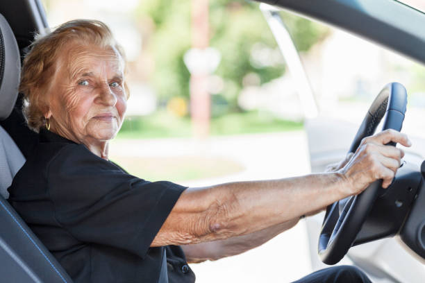 istock Elderly woman behind the steering wheel 600691208