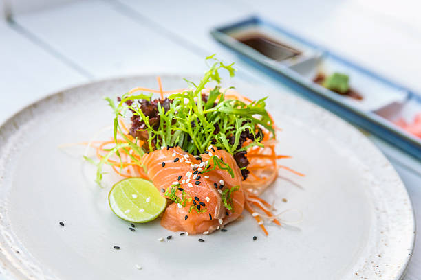 istock Fresh salmon sashimi with sauces 600692816