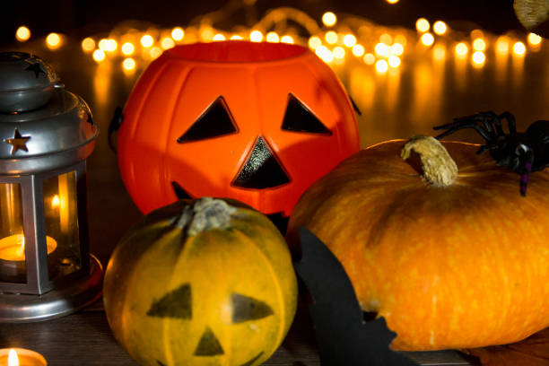 istock Halloween pumpkin head jack lantern on wooden background 600693000