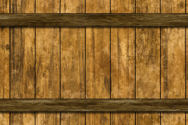 istock Wooden rings with rivets on old barrel 600693302