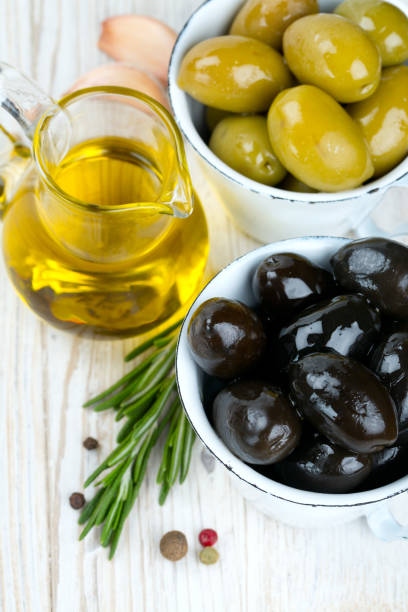 istock green and black olives 600693976