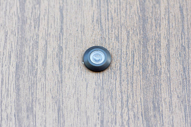 istock Spy hole on the entrance door 600698102