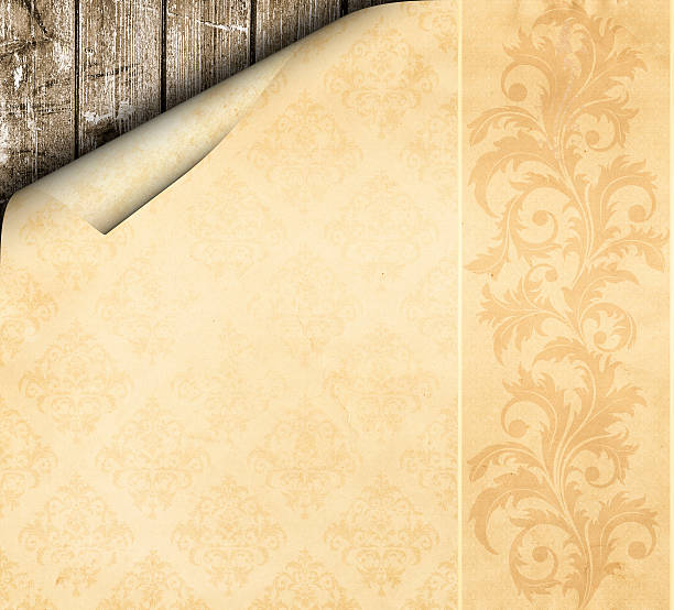 istock Old paper with vintage patterns and curled corner. 600698918