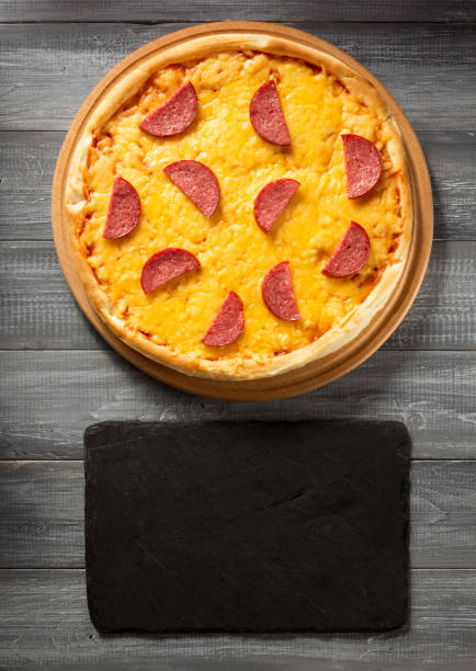 istock pepperoni pizza at wood 600699888