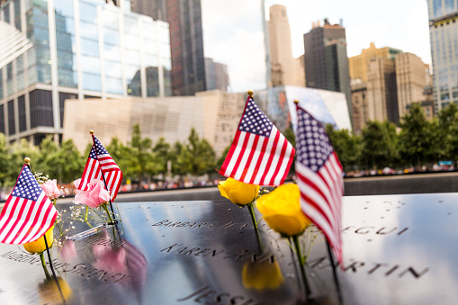 New York, United States - August 20, 2016: The National September 11 Memorial & Museum also known as 9/11 Memorial Museum. They commemorate the September 11, 2001 attacks, its victims, and the World Trade Center bombing of 1993. The memorial is located at the World Trade Center site, the former location of the Twin Towers, which were destroyed during the September 11 attacks. It is operated by a non-profit corporation whose mission is to raise funds for, program, own, and operate the memorial and museum at the World Trade Center site.