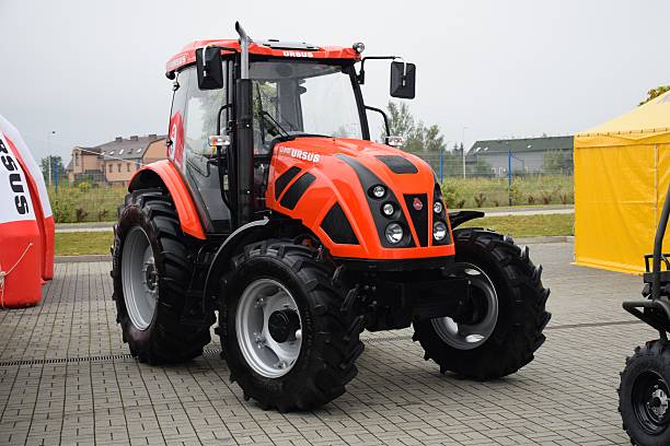 Ursus C-3102 tractor on the show Kielce, Poland - September 6th, 2016: The presentation of Ursus tractor on the show. The Ursus brand is one of the well-known tractor producers in Europe. ursus tractor stock pictures, royalty-free photos & images