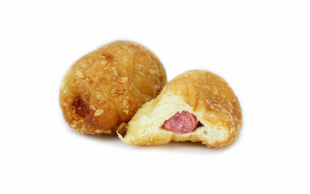 istock two baked bun with sausage inside isolated on white background 600991960