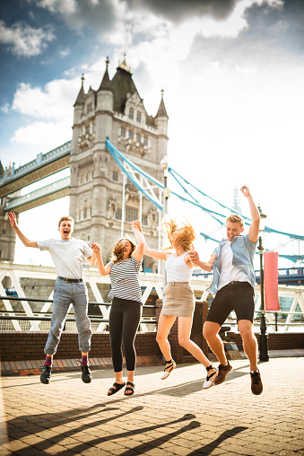 Group of people jumping in london