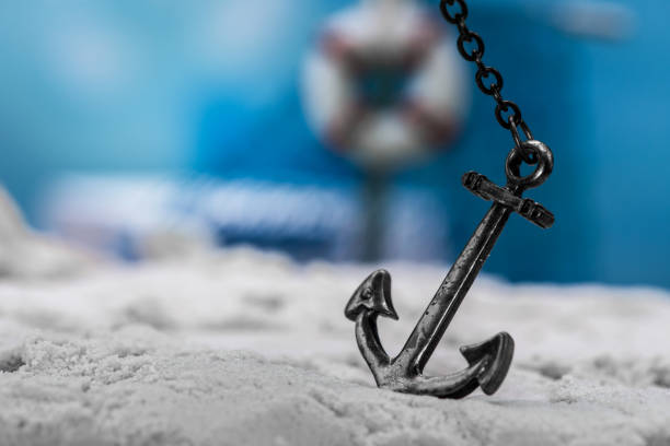 vintage anchor on the beach vintage anchor on the beach quayside photos stock pictures, royalty-free photos & images