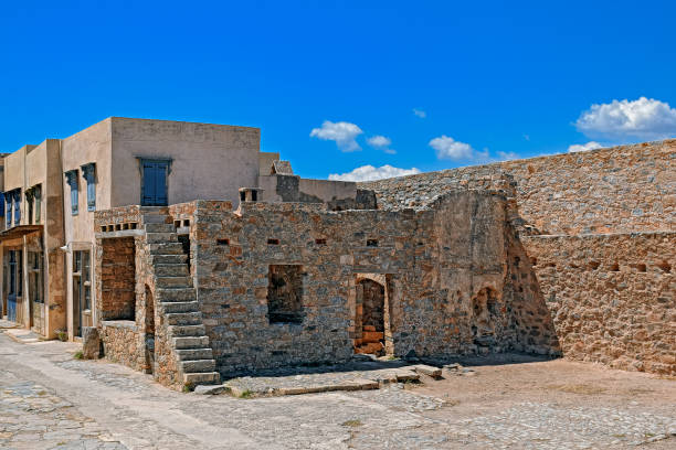 Ruins in the abandoned leper colony on Spinalonga island (also known as Kalydon), Greece.