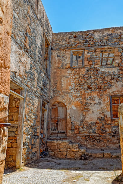 Ruins in the abandoned leper colony on Spinalonga island (also known as Kalydon), Greece.