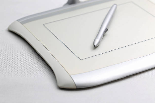 graphic tablet and pressure sensitive pen on white backgroundgraphic tablet and pressure sensitive pen on white background