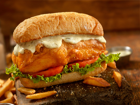 Beer Battered Fish Sandwich on a Ciabatta Bun with Fries  - Photographed on Hasselblad H3D2-39mb Camera