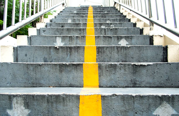 istock overpass concrete staircase with metal hand rail 600996694