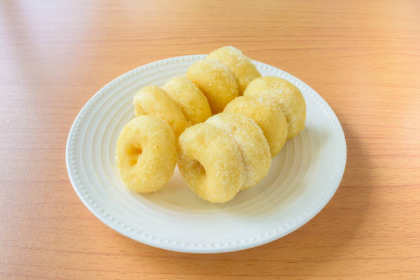 istock Donut bread on wooden table 600998796